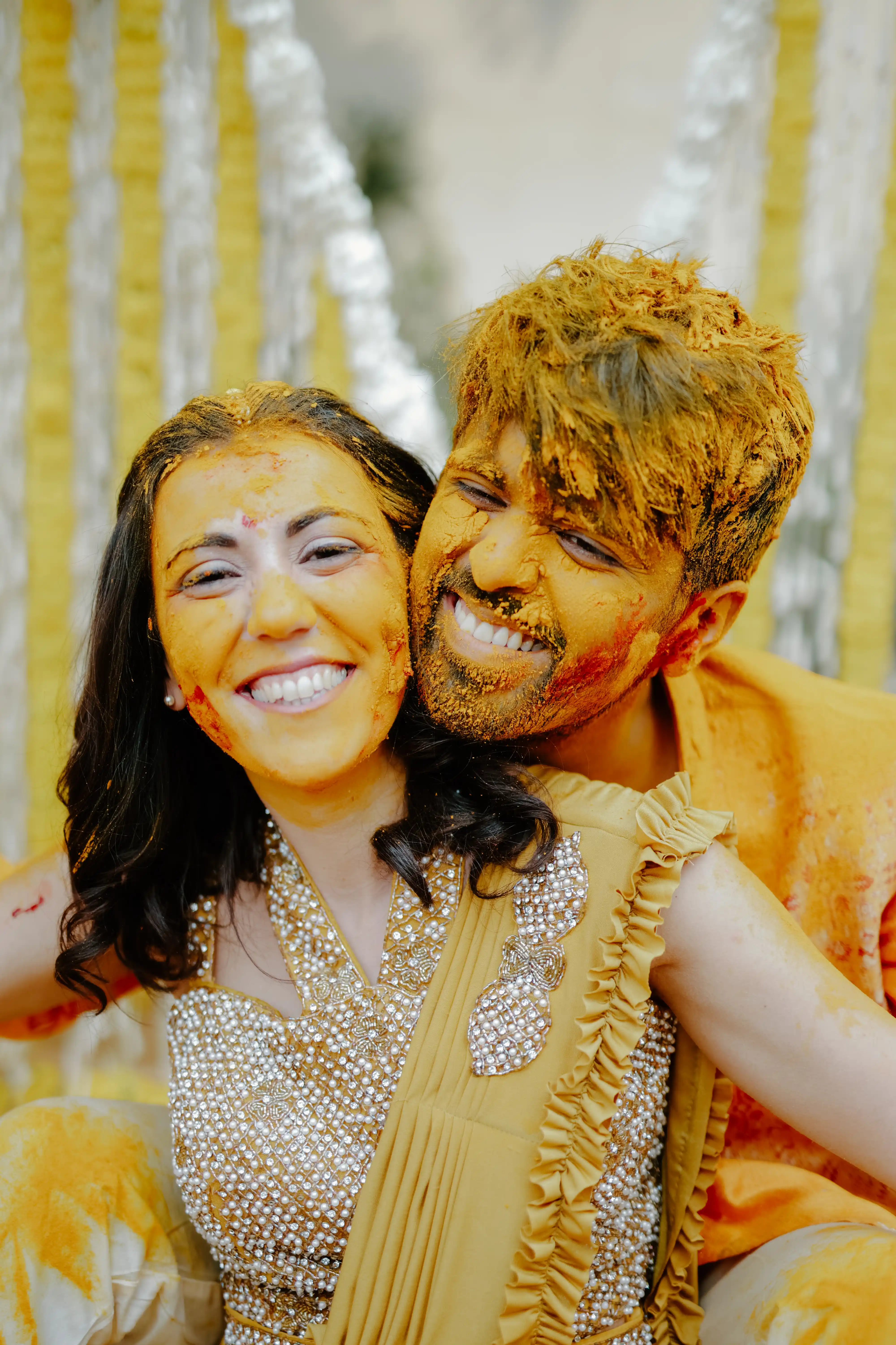Close up of couple Mayank and Elena at their haldi ceremony at Alsisar Mahal, Rajasthan.